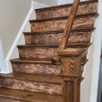 Closeup of new wood staircase with fresh staining.