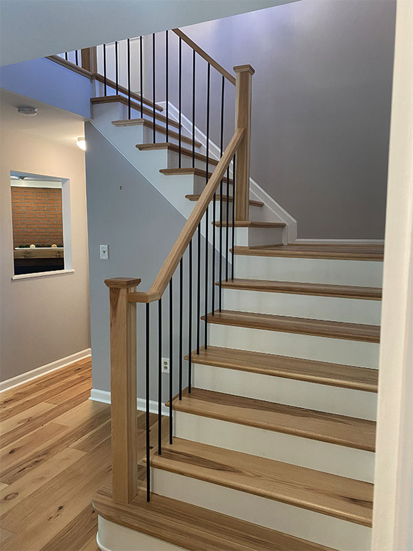Completed custom staircase renovation by Darby Stair Renovations.